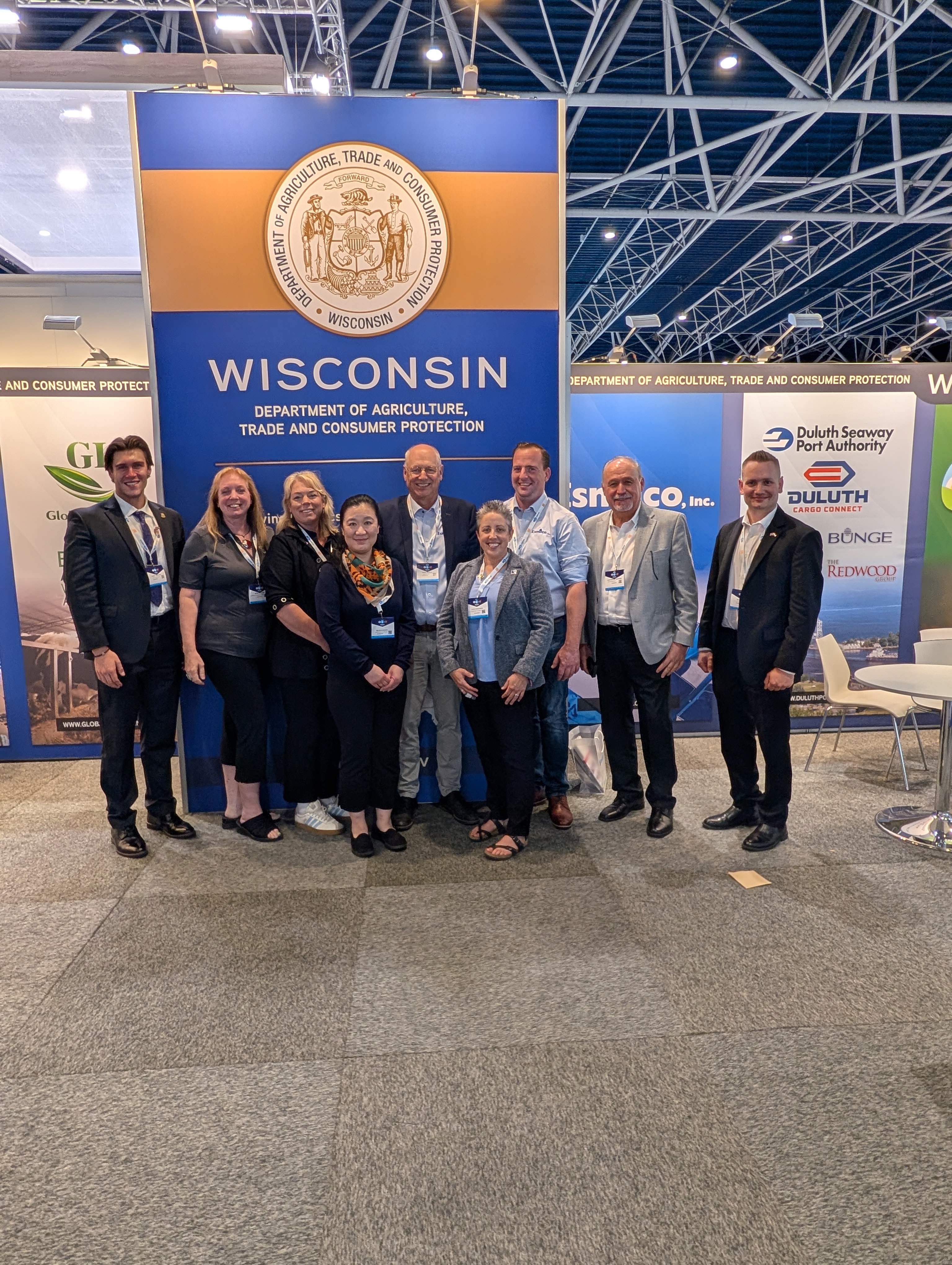 IABC staff and Wisconsin company reps smile in the Wisconsin booth at VIV Europe 2026